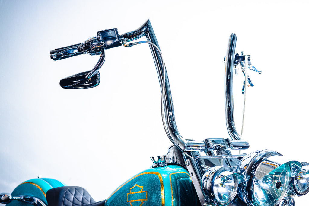A close up of a Factory 47 Nomad Handlebar Chrome 16" motorcycle handlebar.