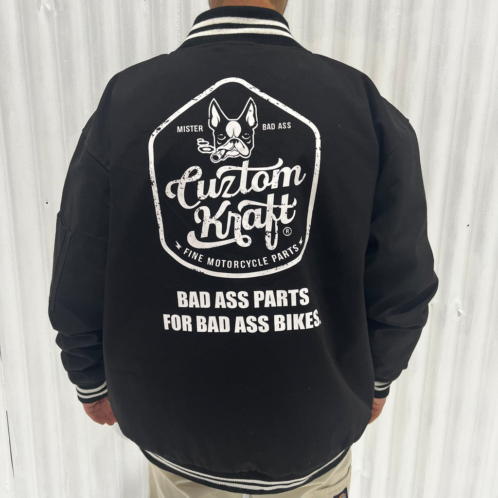 The back of a man wearing a Cuztom Kraft 'Bad Ass' Jacket for bad bikes.