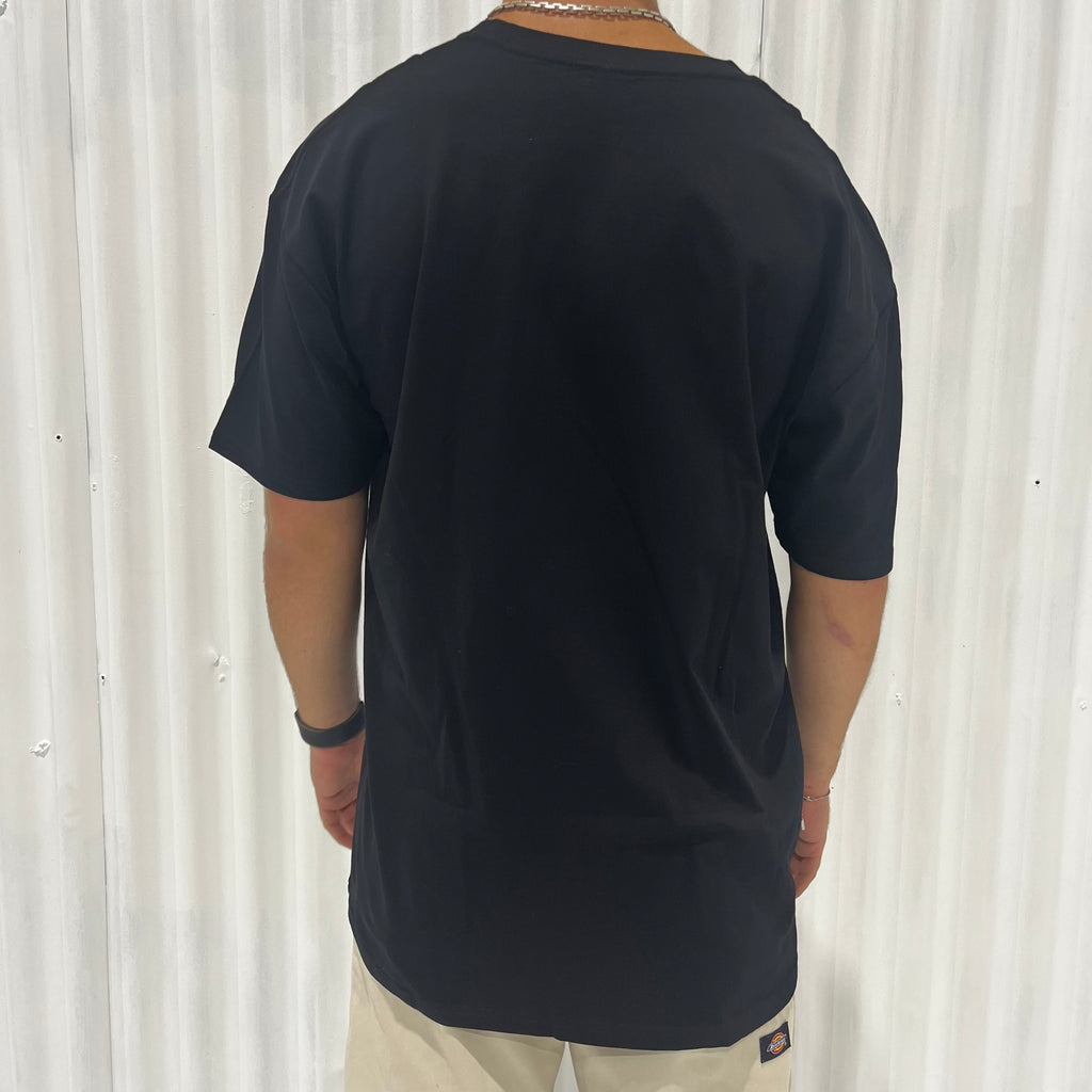 The back of a man wearing a black Cuztom Kraft 'Classic' T-Shirt.