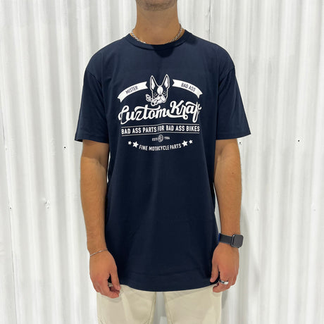 A man wearing a Cuztom Kraft 'Signature' T-Shirt - Navy made of cotton.