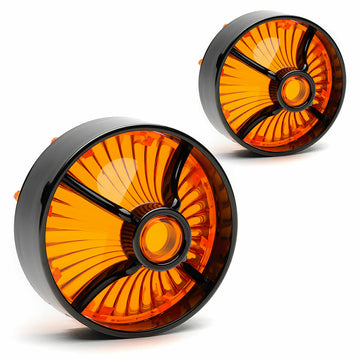 A pair of orange and black Cuztom Kraft Harley Davidson Screw in Lenses - Big Turbine / Black / Amber signal lenses on a white background.