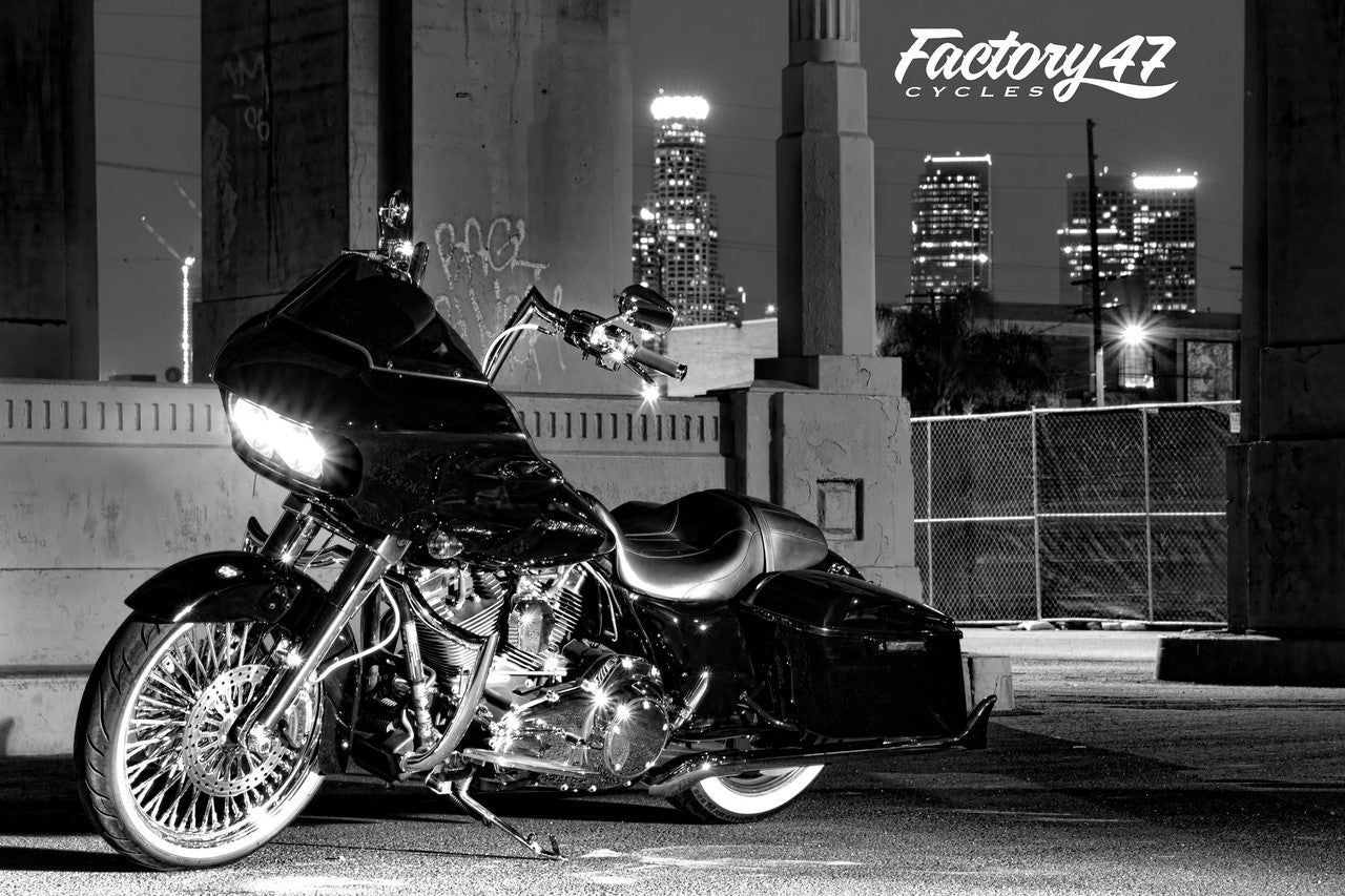 A black and white photo of a Factory 47 Signature Handlebar Chrome 14" motorcycle.