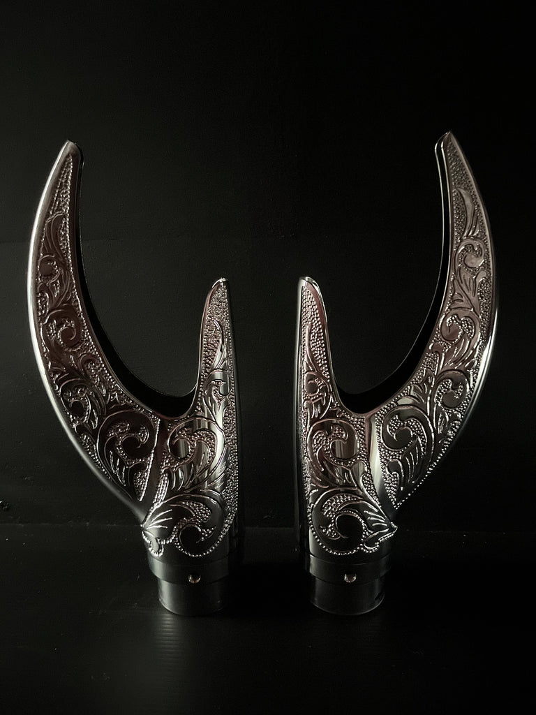 A pair of Cuztom Kraft Reaper Exhaust Tips on a black background.